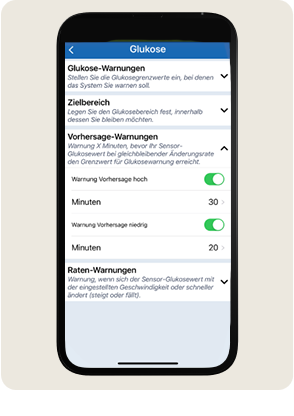 Ein Smartphone zeigt die Einstellungen f&uuml;r die Glukose&uuml;berwachung mit Optionen f&uuml;r Warnungen an.